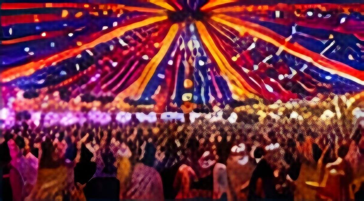 A canopy of colourful lights above a crowd at a Navratri ground